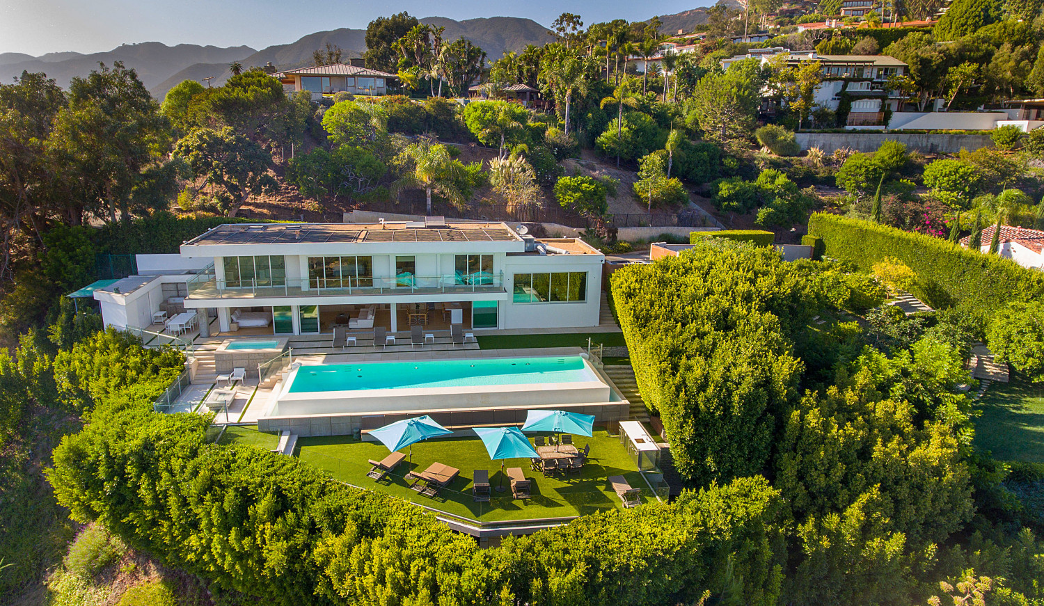 Resort-style swimming pool at the Modern Pacific Palisades Event Estate overlooking the Pacific Ocean