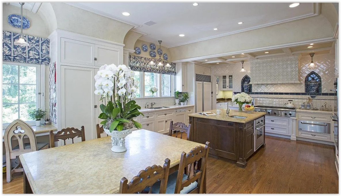 Elegant gourmet kitchen inside a private Pasadena estate featuring custom cabinetry and natural light.