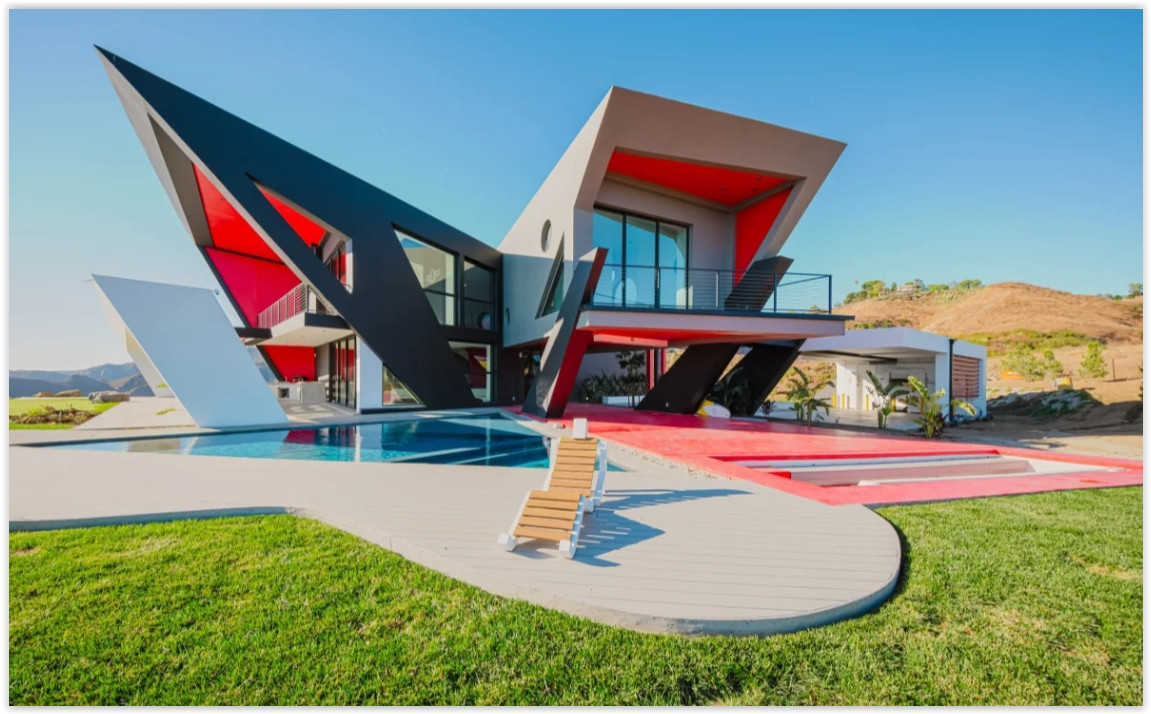 One-of-a-kind contemporary Malibu retreat featuring sculptural architecture, a resort-style pool, and panoramic hillside views.