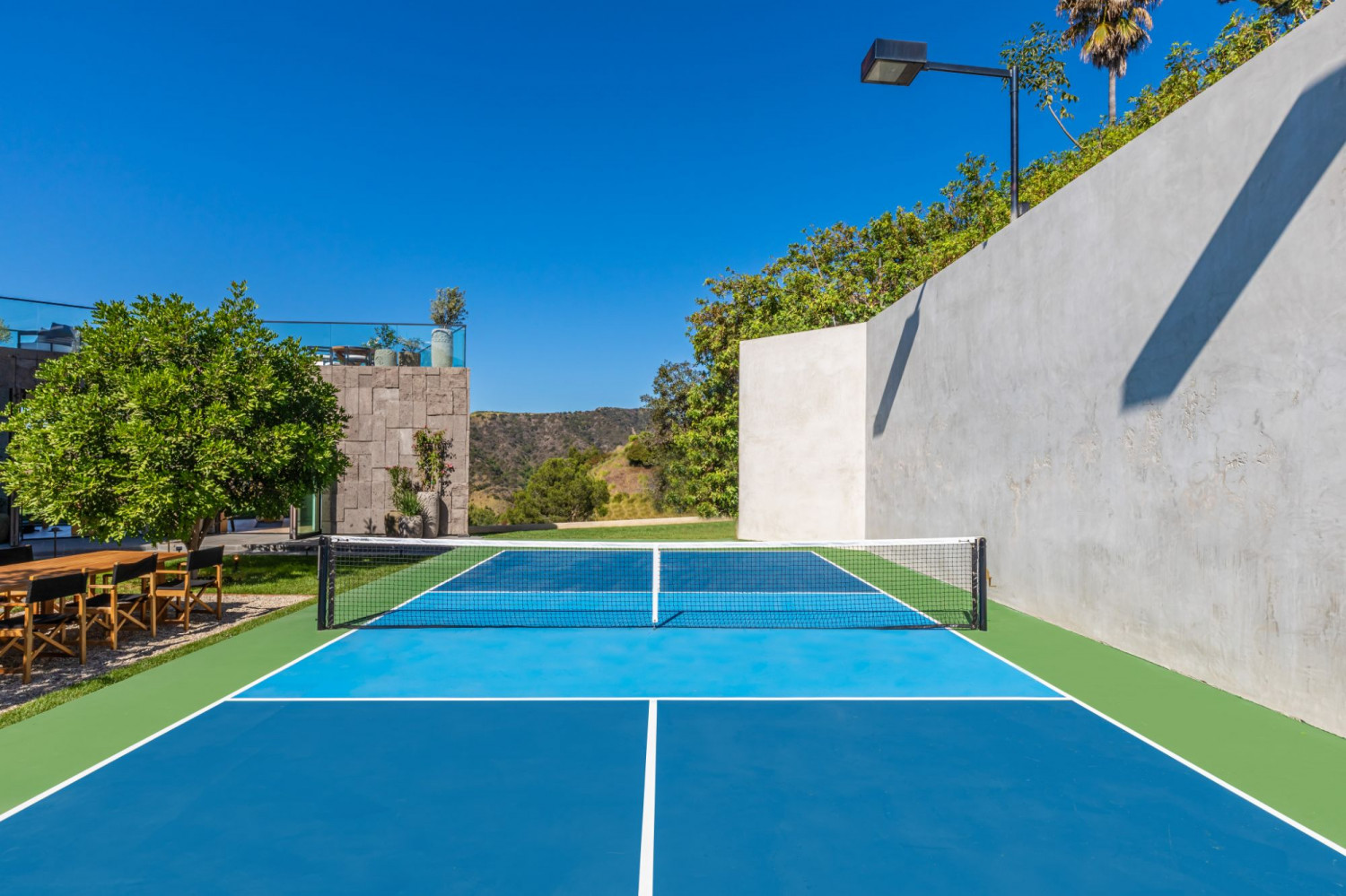Private pickleball court at a modern Beverly Hills estate with canyon views, ideal for corporate retreats, executive gatherings, and private events.