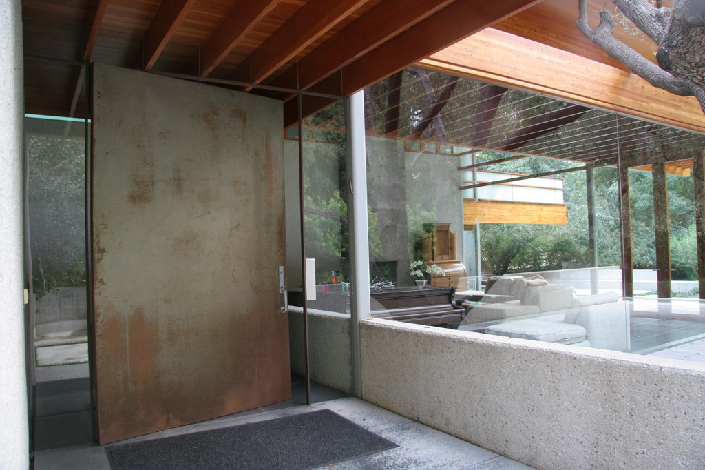 Modern glass entry at the John Lautner estate in Brentwood