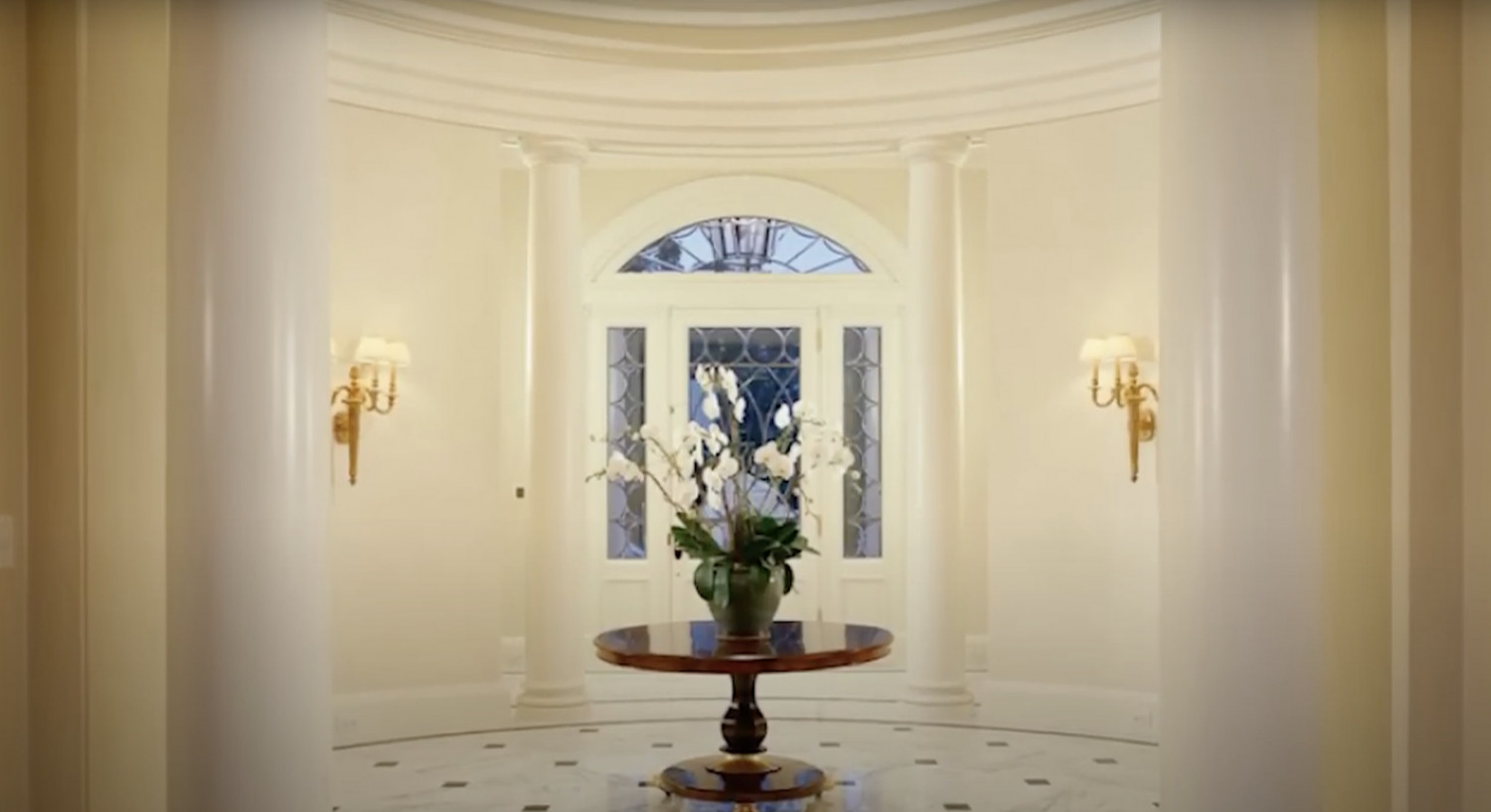 Grand foyer with soaring ceilings inside a luxury estate in Los Angel