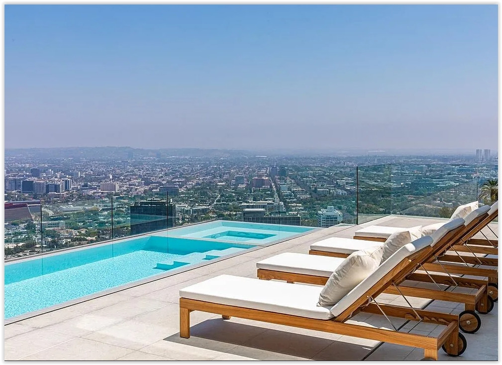 Infinity pool and contemporary terrace with panoramic views across Los Angeles